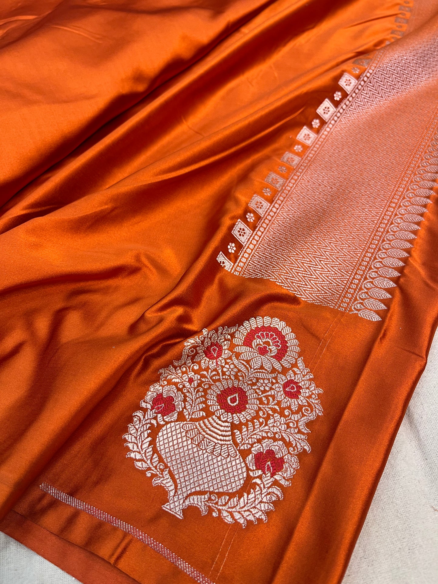 Rust Orange Banarasi Mashru Saree with Meenakari Butta Border Saree