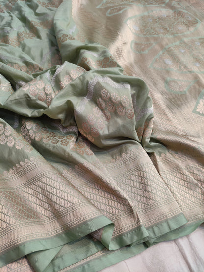 Banarasi Pure Katan Silk Pista Green Base Sarees Enhanced with Distinctive Sona Rupa Zig Zag Detailing