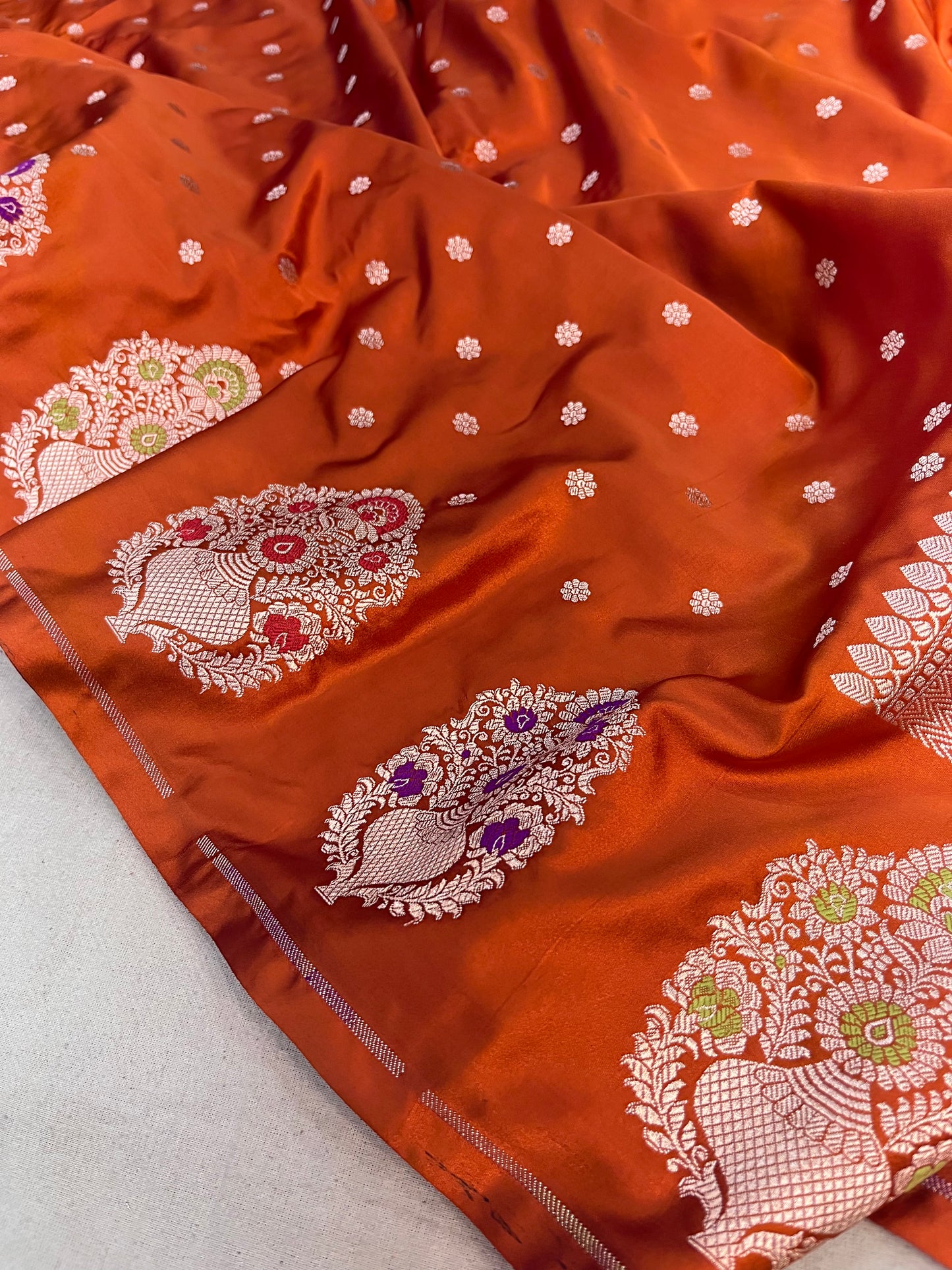 Rust Orange Banarasi Mashru Saree with Meenakari Butta Border Saree